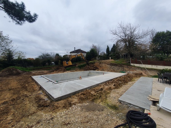 TCTP-24-TERRASSEMENT-PISCINE-CREUSÉE-PELLETEUSE-AMÉNAGEMENT-PARTICULIER-BLOCS-ENROCHEMENT-LIMEYRAT-MONTAGNAC-PÉRIGORD-AVANT